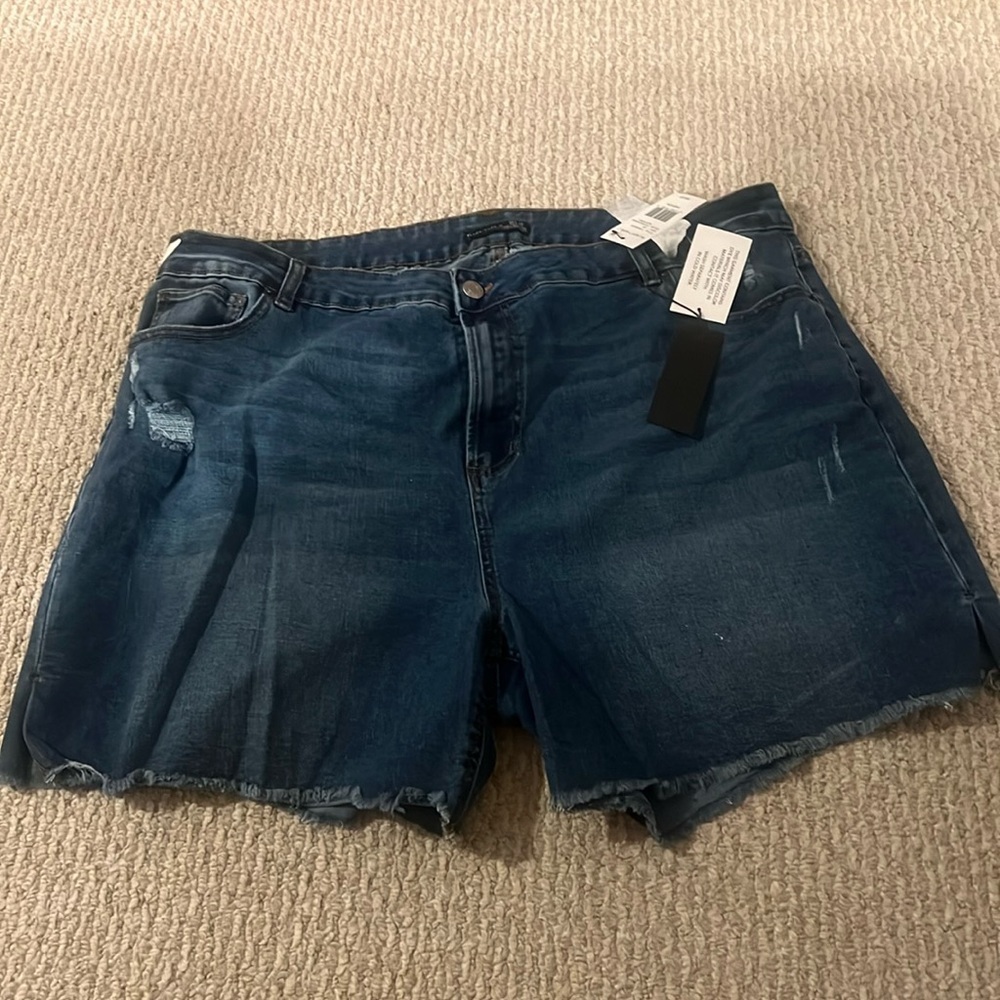 Black tape_ jean shorts